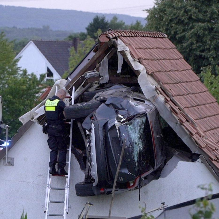 Car crashes into a barn's roof in Germany, seriously injuring 2